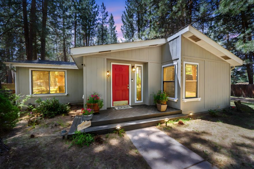 This meticulously maintained 3-bedroom, 2-bath home in Deschutes River Woods offers spacious, modern living on nearly an acre of beautifully landscaped grounds, perfect for outdoor activities and embracing nature. The thoughtfully designed layout features an ensuite bedroom, privately situated on the opposite side of the home from the two additional bedrooms, each equipped with a walk-in closet for ample storage. Luxury vinyl flooring flows seamlessly throughout, complemented by brand-new quartz composite countertops and a cutting-edge steam oven, ideal for culinary enthusiasts. The formal dining room adds elegance, making it perfect for hosting gatherings. Nestled in a serene, private neighborhood with no through traffic, this home provides rural tranquility while remaining just south of Bend, Central Oregon's vibrant hub. Deschutes River Woods blends seclusion with easy access to Bend's renowned amenities, from Mt. Bachelor's ski slopes to the scenic Deschutes River trails.