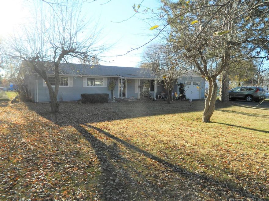 This 3 bedroom 2 bath house sits on .59 acres. There is a living and huge family room included in this 1793 sq ft home. The kitchen has corion counters. The back yard is fully fenced and front yard has vinyl fencing. Property has KID irrigation to keep the water costs down. Please excuse the clutter as family is in the middle of getting ready for an estate sale