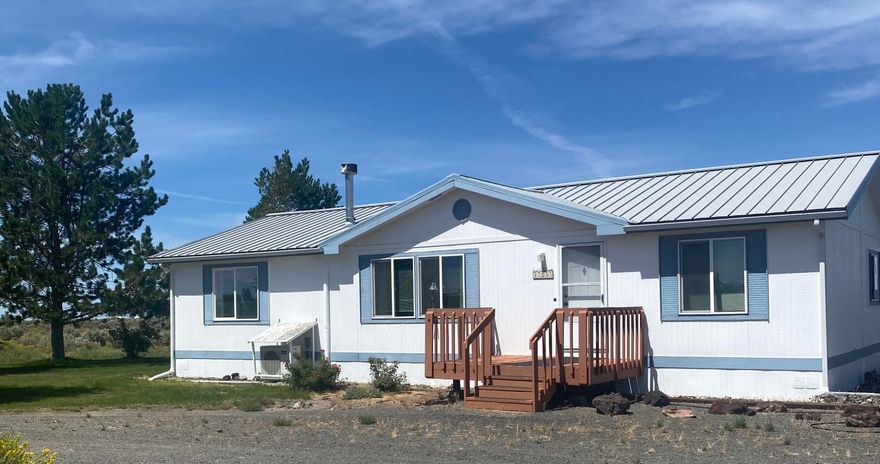 Room to Play, Space to Stay! Discover this 3-bedroom, 2-bath, 1,404 sq. ft. home on 2.4 acres, just minutes from the heart of Christmas Valley. The 48' x 27' detached three-car garage/shop includes additional loft space and offers abundant storage. There's plenty of room for your RV, complete with a hookup—perfect for all your toys and gear. Enjoy privacy, stunning distant mountain views, and easy access to the famous Christmas Valley Sand Dunes for endless outdoor adventures. Whether you're looking for a full-time home, vacation getaway, or basecamp for recreation, this property has you covered! More pictures coming soon.
