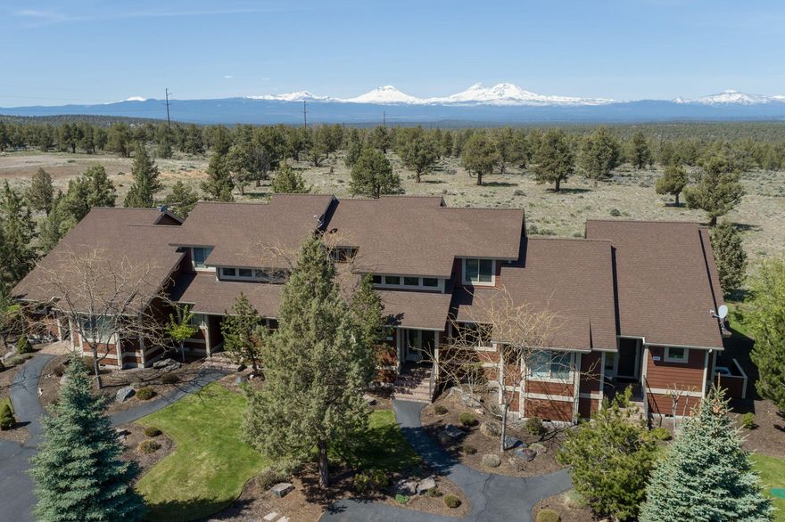 One of the most private locations in Eagle Crest Resort with stunning Cascade Mountain views! Turnkey with beautiful furnishings throughout. The great room floor plan features soaring ceilings, walls of windows, a built-in entertainment center, a gas fireplace, a spacious dining room, and a kitchen with granite counters, a breakfast bar, and slate floors. The primary suite boasts a walk-in shower, a soaking tub, and a double-sink vanity. Two guest rooms, a full bath, and a loft on the upper level. Enjoy the sunsets from the expansive paver deck with a hot tub. You won't want to leave the deck! Eagle Crest is home to three 18-hole golf courses, three sports centers with pools and spas, indoor/outdoor tennis, basketball, and pickleball courts, and miles of trails for hiking, walking, and bicycling.