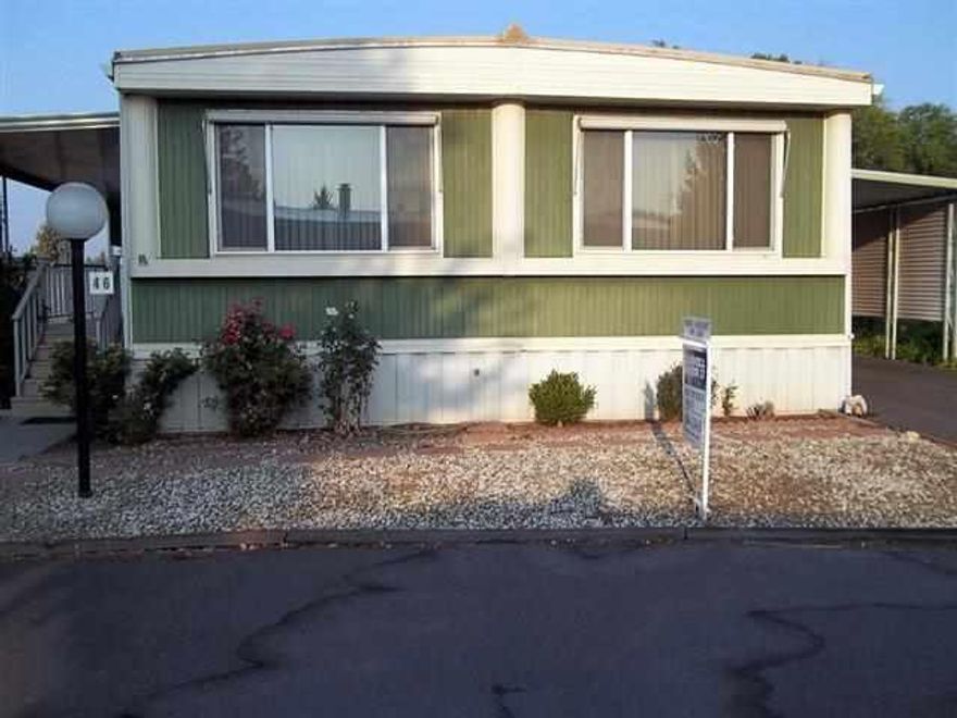 2 Bedroom 2 Bath Updated Home In Quiet Area. Kitchen Appliances Included, Carport & 3 Storage Sheds. Close To Bus Line & Shopping. Low Maintenance Yard.