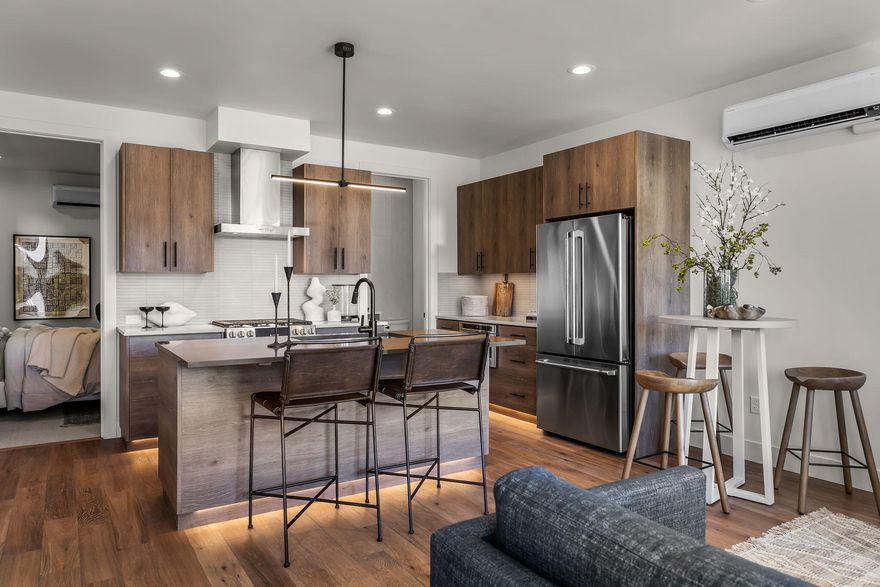 These architectural gems showcase luxury at every turn, with expansive high ceilings, multiple outdoor terraces offering sweeping skyline views, three generously proportioned en-suite bedrooms with sizeable walk-in closets, ensuring a haven of comfort and luxury. The heart of each home is an open-plan living space, where every detail from the dream kitchen — equipped with a full-length island, pristine quartz countertops, high-end stainless steel appliances and copious storage — has been carefully selected to cater to the culinary enthusiast, to the beautifully engineered hardwood flooring and gorgeous picture windows. Convenience meets style with spacious two-car garages, offering ample storage and the modern necessity of 220V plugs for electric vehicle (EV) charging hook-up and solar ready. The allure of outdoor living is undeniable, with easy public access to the river just one block away and perfectly positioned near Downtown, the Box Factory and the vibrant Galveston corridor.