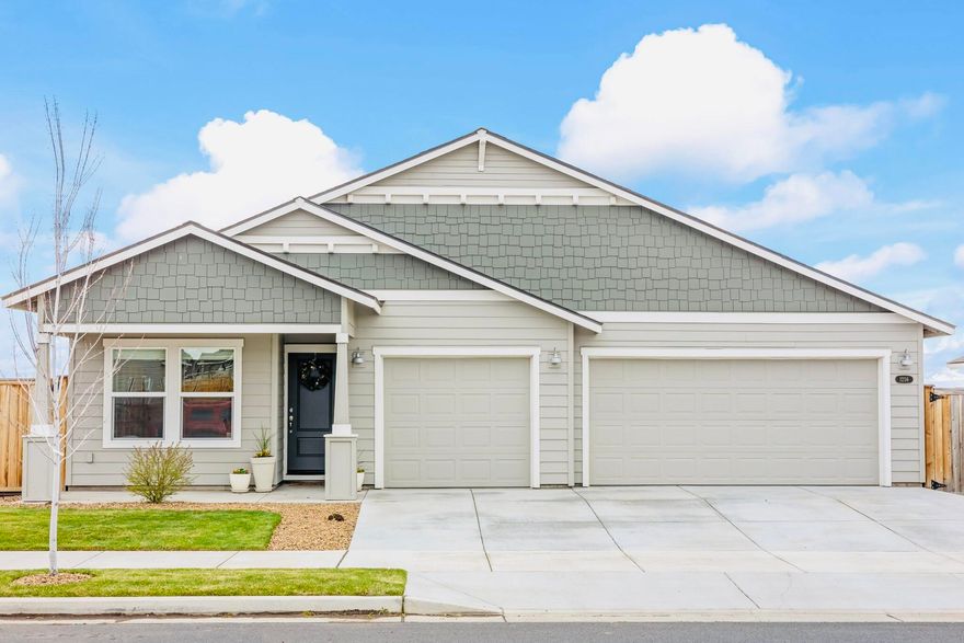 🏡 Back on Market - No Fault of Seller! **Elegant Craftsman Sanctuary & Entertainer's Paradise with Panoramic Views** This exquisite 4-bedroom, 2-bathroom Craftsman residence showcases sweeping vistas of the golf course, park, and Cascade Mountains in one of Madras' most sought-after communities. The open-concept design features rich LVP flooring, gleaming quartz countertops, and premium stainless steel appliances. A chef-inspired kitchen with an elegant eating bar flows into a sophisticated living area adorned with a warm fireplace and picture-perfect views. Indulge in the spa-style soaking tub or host unforgettable gatherings in the outdoor art studio, complete with a secluded hot tub and a professionally crafted shaded gazebo. The expansive three-car garage with workshop provides generous storage, while gated RV and boat parking with two storage sheds enhances convenience. Nestled beside lush green space with private access, this home offers ultimate serenity. A rare opportunity.