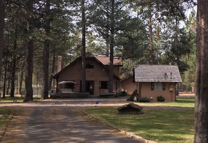 Cozy cabin w/lots of elbow room. Potential guest house on property. Park like setting. Neighborhood has a private dock for access onto Deschutes River. Very close to Sunriver & 18mi to Mt. Bachelor. 16mi from Downtown Bend. Live in existing home & potentially build your dream home on the other lot. Lots of potential w/this wonderful property. New roof as of 2015. Septic pumped summer 2016. Acreage of 1.38 is for both lots. Separately they are .72 and .66. Fishing, hiking, boating, golfing, skiing galore!