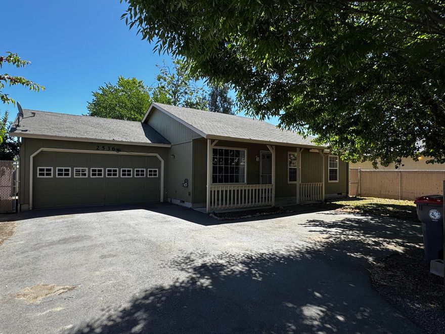 This is your opportunity to own a sweet little 3 bed, 2 bath home on your own private lane.  Set back off the street, enjoy your privacy and a good sized back yard. Inside you'll experience vaulted ceilings, an open kitchen with good sized eating area and an attached 2 car garage!