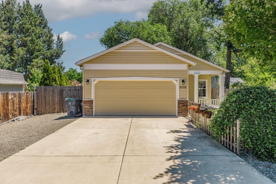 Lovely Central Point home on a low traffic road. This home gives the feel of being in the country with all of the lush greenery and trees for added privacy. 3 bedrooms and 2 bathrooms with a large RV Parking area. Light and Bright Great room with 9 ft ceilings and a cozy gas fireplace. The Kitchen adjoins the Dining Room with a counter top bar. The dining room allows for a large dining table and even has a wainscoting accent wall. Stainless appliances, granite countertops, and solid wood cabinetry in the kitchen. Split floor plan gives the primary suite privacy. The Backyard patios are great for entertaining or relaxing while taking in the beautifully landscaped yard and adorable garden shed with a lien-to.