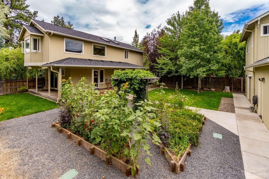 Location, location, location, three blocks from Drake Park, Downtown Bend, multiple parks, restaurants, pubs, concerts, river and more. This updated main house and separate studio, designated parking and separate entrance with ADU potential sits on a corner lot and is completely fenced for the utmost privacy. The home boast 2 master suites, beautiful open space with high ceilings, updated kitchen with spacious leather granite counter tops, great for entertaining, a large bonus room with built-in kitchenette, includes a closet and could be used as an additional bedroom. Separate, oversized 2 car garages, room for RV and 20x20 shop. All of this within walking distance to all Bend has to offer.