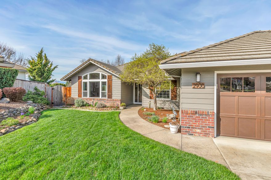 Do you believe in love at first sight? You will for sure when you visit this gorgeous home! Fantastic cul-de-sac location with stunning curb appeal! Upon entering, you'll notice the pristine condition, quality of materials and inviting open floorplan. It beckons you to further explore the expertly designed kitchen, the dining area and comfortable formal living room! Then, take a stroll out to the deck, not only do you get a view of the mountains and mature landscaping but also have a private, solar heated, top of the line ''Pebble-tech'' salt water pool with pool house! This home has an over abundance of features and amenities such as; it's beautifully landscaped with timed sprinklers, gated extra parking with storage shed, hardwood floors, gas fireplace, double vanities, newer tinted windows, concrete tile roof and so much more! Are you in love yet!?