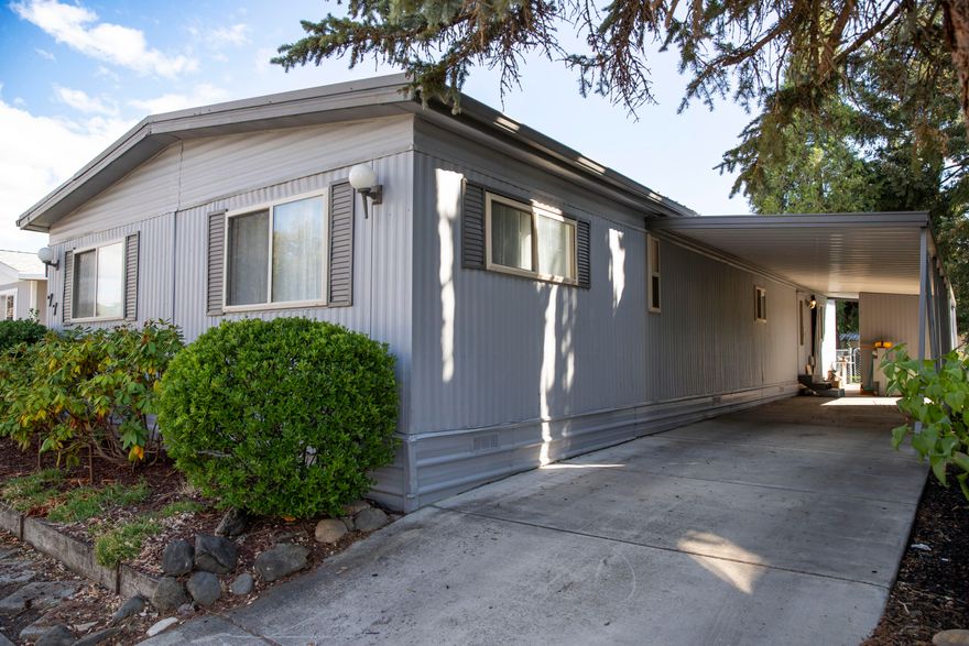 Fully remodeled 1,440 sq. ft. manufactured home in a 55+ park, featuring new flooring throughout as well as new cabinets, sink, and dishwasher. Freshly repainted both inside and out, with a durable metal roof. Modern updates throughout make this home move-in ready. A fantastic option for buyers seeking a beautifully upgraded space in a peaceful community!