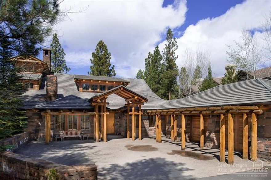 Beautifully designed lodge style home in the gated comminuty of Broken Top. Private lot with spectacular views of the 15th fairway, 3 bedrooms, main level master suite with two additional master suites. Expansive vaulted great room with magnificent floor to ceiling fireplace, gourmet kitchen, media room, office with additional fireplace, upstairs loft plus a very special hideaway room. Built with quality and detail by Sun Forest Construction.