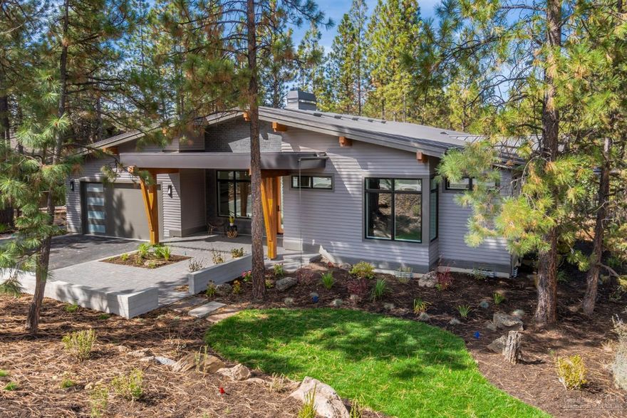 Nestled in the pines in a cul-de-sac in the exquisite Glen Neighborhood of Tetherow Golf Resort and Community, this single level Northwest Contemporary home is now newly completed! Built to high level standards with an expansive deck overlooking a wooded lot and the pinnacle of custom finishes throughout, this 3 bedroom, 3 bathroom home boasts an open floor plan, a spacious media or family room, an office/den, and includes a high-end appliance package, landscaping and a Tetherow Golf Membership. Lighter colored finishes, high ceilings and many large windows and skylights provide a bright and airy feel. The charming Glen neighborhood offers privacy and access to open spaces, hiking and world class mountain biking trails, a sense of community and easy access to Bend's west side. Make this gorgeous new home and community yours today.