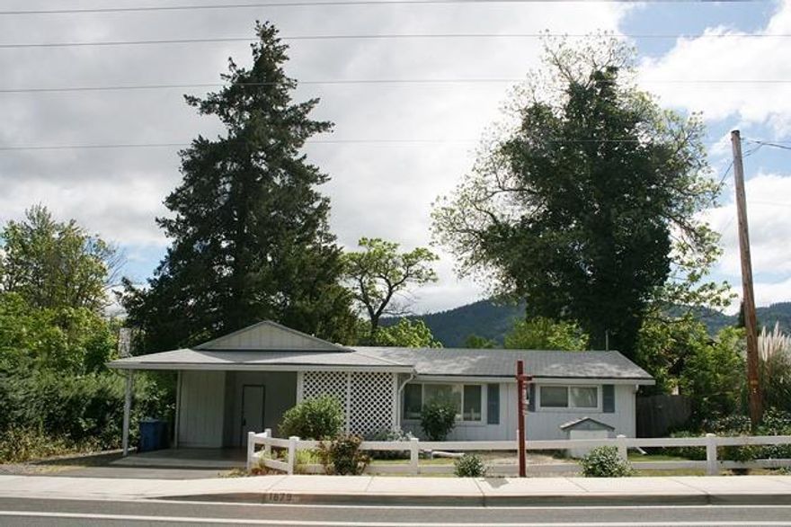 Very nice 2 bedroom, 2 bath home, plus den/office, living room with large picture window, family/dining room combo with pass through to kitchen. There is room to expand the kitchen, indoor laundry and nice storage pantry. Some updates have been done in 2014, such as vinyl windows, new insulation in the attic, 2nd bath added & new water heater. Exterior features a nice carport, large, fenced back yard, 2 sheds and patio. Home is on city water & sewer, but has a well for irrigation. Still room to make it your own! Don't miss this gem!