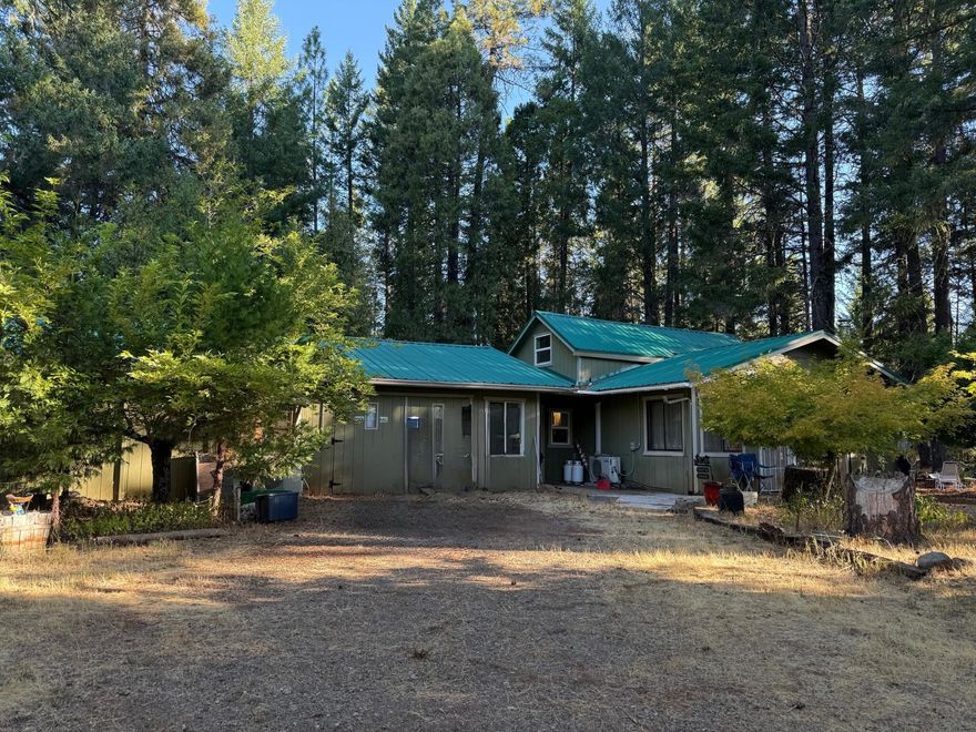 Discover the Perfect blend of comfort, privacy and country living at this O'Brien property. 
Situated on a generous parcel, this 3 bd 2.5. bath home nestled in the serene Illinois Valley offers a peaceful escape while being close to amenities, hiking, and Southern Oregon's natural beauty. Property features include Private gated entrance, 
RV hookups, Generator inlet box, and Metal updated Roof. Whether you're seeking a family home, or a peaceful getaway, this property will accommodate your vision.