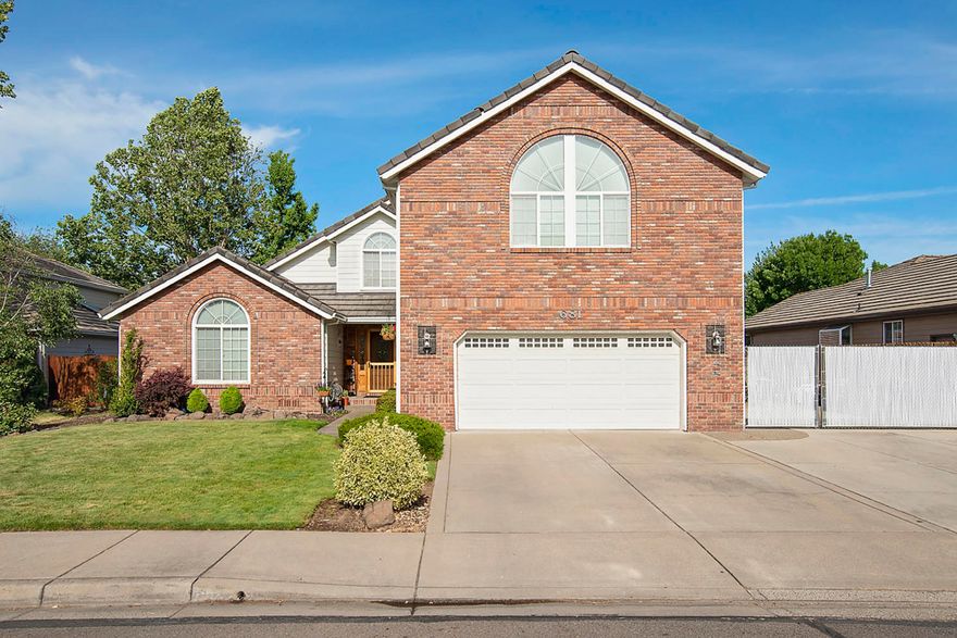 This beautiful home features almost 2600 sq. ft with 4 bedrooms and 3 full bathrooms.  There are two master suites in this home.  One is located downstairs and the other is upstairs.   Great floor plan with a large kitchen with granite counters tops, plenty of cabinets and counter space.  Hardwood floors flow downstairs.  Large living room.  The master suites have walk in closet and double vanities.  The other room as very large.  Outside you will find long and wide RV parking for RV and toys.  The backyard has a wonderful inground swimming pool and area to entertain all of your guest.  Great location.