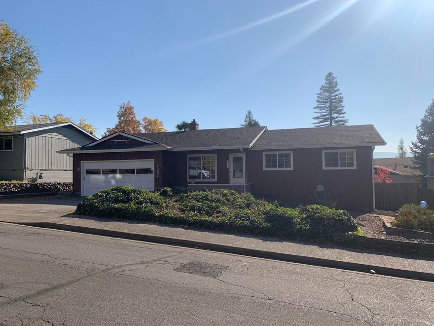 Really nice NE Grants Pass neighborhood with current owner maintaining property and site improvements since 1976. Newer roof and hybrid (bryant) Heat pump and separate a/c in last year. Clean, neat and affordable 3 bed 1.5 Bath home in popular area of Grants Pass for convenience to shopping, schools, churches, etc. Well manicured front and back yard too. This one should sell fast with homes in this price range hard to find. Lots of extras included like woodstove insert, washer/dryer, patio furniture and work bench in the garage. Double pane vinyl windows installed in 2005; Dishwasher 2012; Refrigerator 2015; Washer/Dryer 2016; Range/oven combo 2019; Structural beam and posts under house in 2011; New back and side fence in 2012; House painted in 2013; Kitchen update 2013 including counter tops and tile back splash; Hardwood living room and hallway floors 2015; New roof and gutters in 2019.