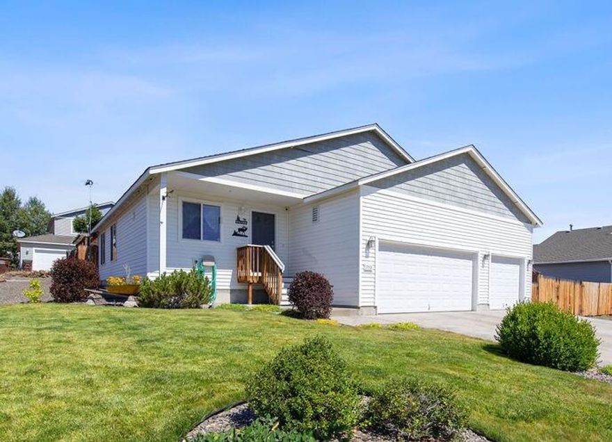 Stop the car!  This single level, 3 bedroom, 2 bath home has a three bay garage and RV/boat parking!  There is a storage building and a fenced yard as well as a covered patio space.  The light and bright living area is open with vaulted ceilings that make it live large.  An island in the kitchen make it a lovely work space!  It's just a short walk to the wetlands (on the north side of town) and on to the Barnes Butte trail system.