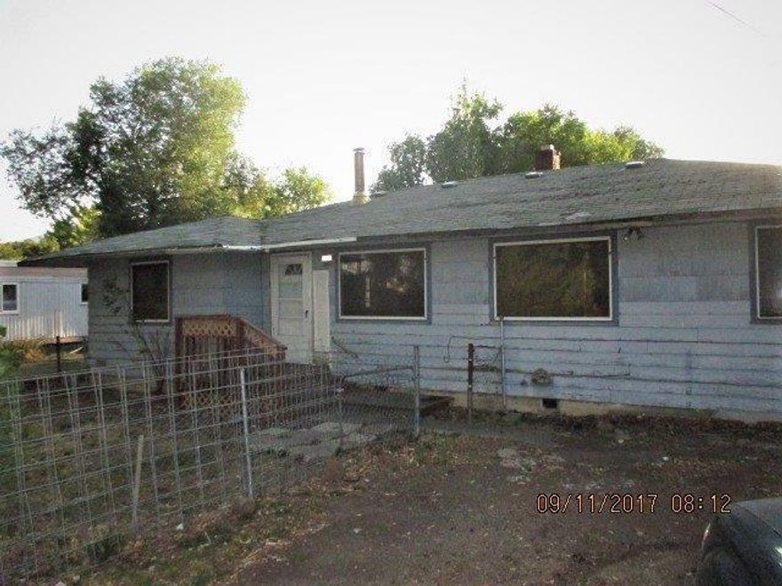 Potential! This property needs a lot of work (complete rehab), large parcel has detached garage, the property is sold as is and a trash out is needed.