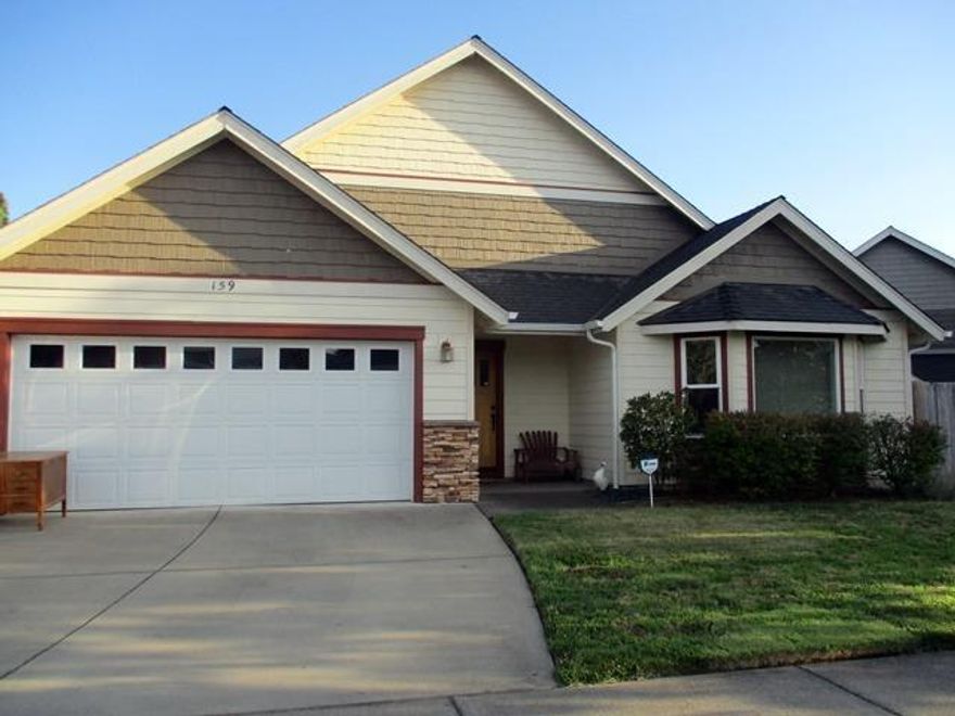 Beautiful home in a great neighborhood. Slab granite counter tops Cherry cabinets, vaulted ceiling, ceiling fans. Master bath has a tiled, walk-in shower. Covered patio, in ground sprinklers, mature landscaping.