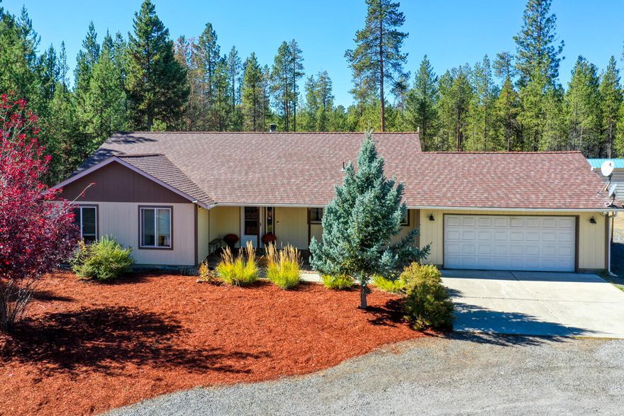 Wonderfully well maintained home on 1.13 acres. Plenty of room for your RV, toys, and critters with huge fenced back yard, 16x32 covered storage and chicken coop or storage shed. Single-level home boasts roomy kitchen with stainless appliances, hardwood floors, great room with vaulted ceilings and ceiling fans, and remodeled laundry room. Bathrooms have newer fixtures and tile floors.  1 year old 80 gallon hot water heater. Come see before this one is taken!