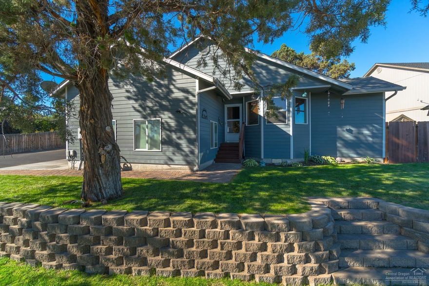 Enjoy sweeping views of the Cascades to Smith Rock & beyond! RV parking for most anything AND a great house too. Recently updated home w/vaulted Great Room, laminate flooring & a fantastic multi level Trex deck off living area that's perfect for entertaining. Master Ste has vaulted ceiling, plenty of natural light & wrap around closet. 3rd bedroom has stairs up to a loft play area that the kiddos are sure to love! Back yard is a gardener's dream w/raised beds, greenhouse & built in vegetable garden.