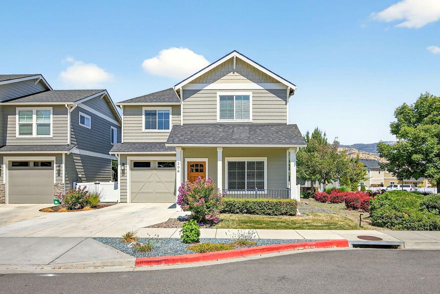 Price Reduced! This light filled home is warm and spacious with many thoughtful details and intimate nooks to relax in. Gorgeous  wood floors downstairs.  The upstairs primary bedroom looks out to Grizzly Peak and another upstairs bedrooms looks out on Wagner Butte and Siskiyou mountains. On a corner lot surrounded on the side and back by a beautiful, grassy common area maintained by the home owners association. With hardwood floors downstairs and second-story mountain views, it's just a short walk to downtown Talent with the Camelot Theater performing live stage plays (see camelottheatre.org/2025-season/ ), coffee shops, supermarket and quaint boutiques. It is also only 5 miles to downtown Ashland with the Oregon Shakespeare Festival and Lithia Park. The 20-mile long Bear Creek Greenway walking and biking path is  just blocks away.