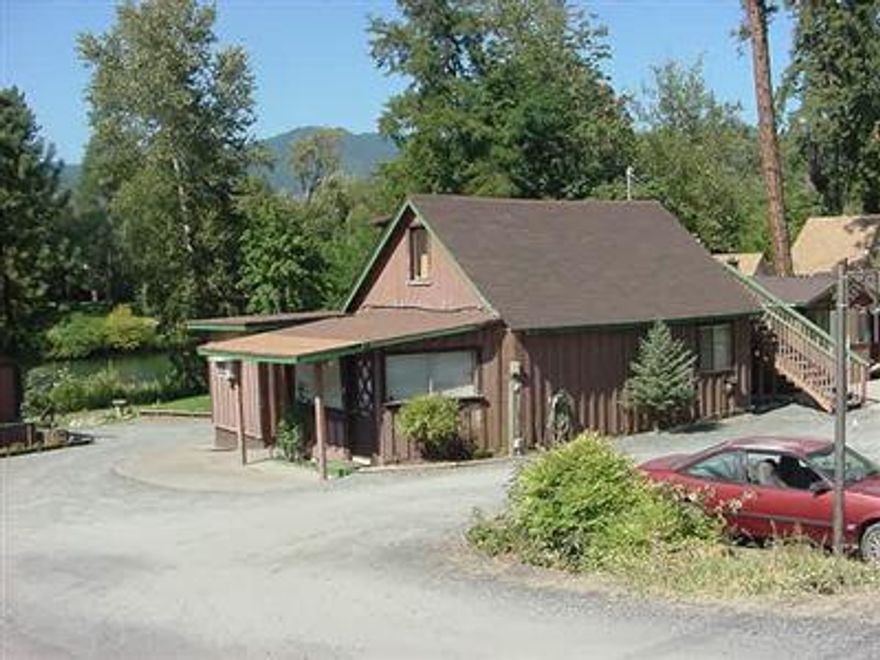 On the Rogue River. One single family home and 8 units plus an RV space. An additional unit could be built in the RV space. Look @ these numbers - 9.8% cap rate or more if owner managed. 1 acre property slopes down to beautiful river access. Recent remodeling includes new power for each unit. Single family home could be owner residence. This property is exempt from property disclosure/disclaimer law because it is more than 4 units. Includes owners shop. Newer roofs on most units. Zone tourist commercial could be run as motel. SELLER MOTIVATED - BRING ALL OFFERS