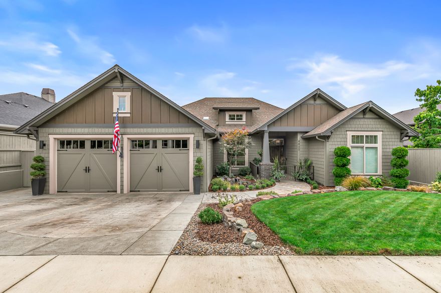 Welcome to this stunning single-level craftsman-style home in East Medford's premier, tree-lined Summerfield neighborhood. A peaceful water feature greets you at the entry. This split floor plan offers upscale finishes and main-level living. The open kitchen features quartz counters, tiled backsplash, 5-burner gas cooktop, and a large island. The vaulted great room includes a wood beam ceiling, gas fireplace, and beautiful wood floors. Relax in a very spacious primary suite offering wood beam accents, spa-like bath with soaking tub, tiled shower, double vanity, water closet, and large walk-in closet. Tile flooring in all baths and laundry/mudroom with built-in cabinetry. Experience luxurious outdoor living beneath the covered patio, surrounded by beautiful landscaping, a tranquil saltwater in-ground pool and breathtaking panoramic mountain views. You will appreciate the oversized 2-car garage with epoxy flooring and workspace or storage area.