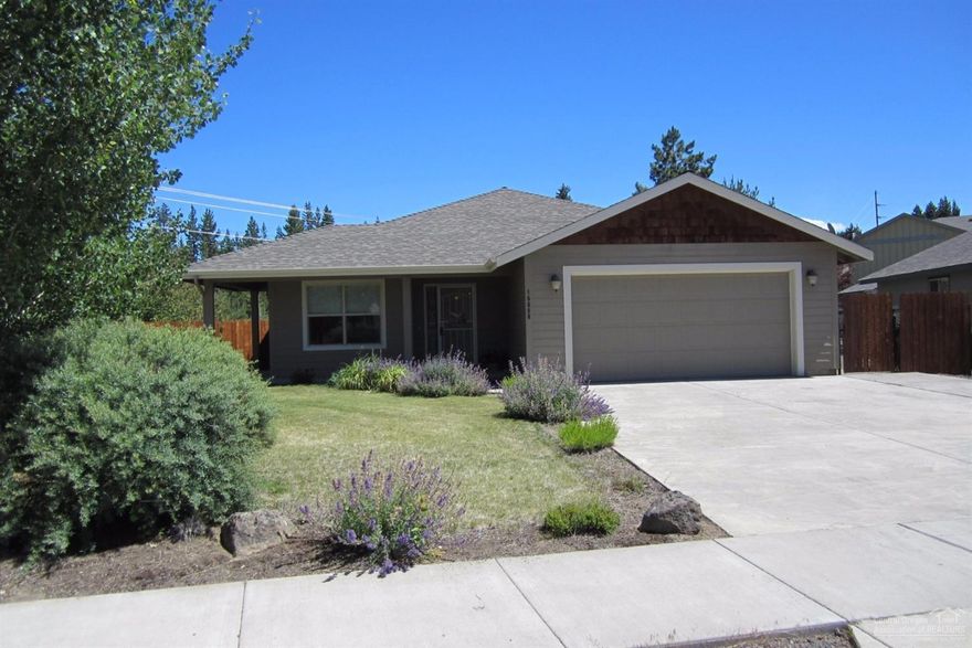 Beautiful custom built home w/ all the upgrades. 3 bed 2 bath + office, open great room living, stainless steel appliances, granite counters, tile, simulated wood vinyl floors, vaulted ceilings, designer light fixtures, custom window coverings, forced air electric with heat pump, gas fireplace, central vacuum system w/toe kicks. Large back patio and covered front porch. Beautifully landscaped and irrigated with a soothing water feature. Oversize concrete driveway. Fenced & gated. This home shows like new.