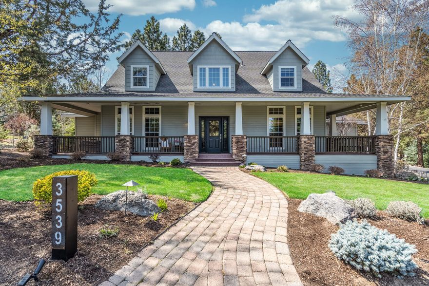 Located on a charming, peaceful street in the sought-after community of Awbrey Glen, this elegant home offers exceptional design throughout and embraces Westside living. Outstanding curb appeal features a .41/acre park-like setting and welcoming wrap-around front porch. Great Rm w/stunning, custom-designed stacked stone fireplace, expansive concrete hearth and European white oak hardwood, offers direct access to back deck, creating an ideal space for entertaining and gathering. Cook's Kitchen w/solid surface countertops, SS appl, and separate bar, opens to the Great Rm + delightful sitting rm and Formal Dining Rm. Spacious MAIN LEVEL Primary Suite features hw floors, luxurious BA w/Quartz vanities, spa-like shower w/sleek finishes, and radiant flooring. Private Home Office conveniently located w/in Primary Ste. Upstairs:2 oversized BR and full BA. 4th BR/Bonus Rm + full BA w/separate back staircase located above garage. Moments to tennis, golf, walking paths and all Westside amenities.