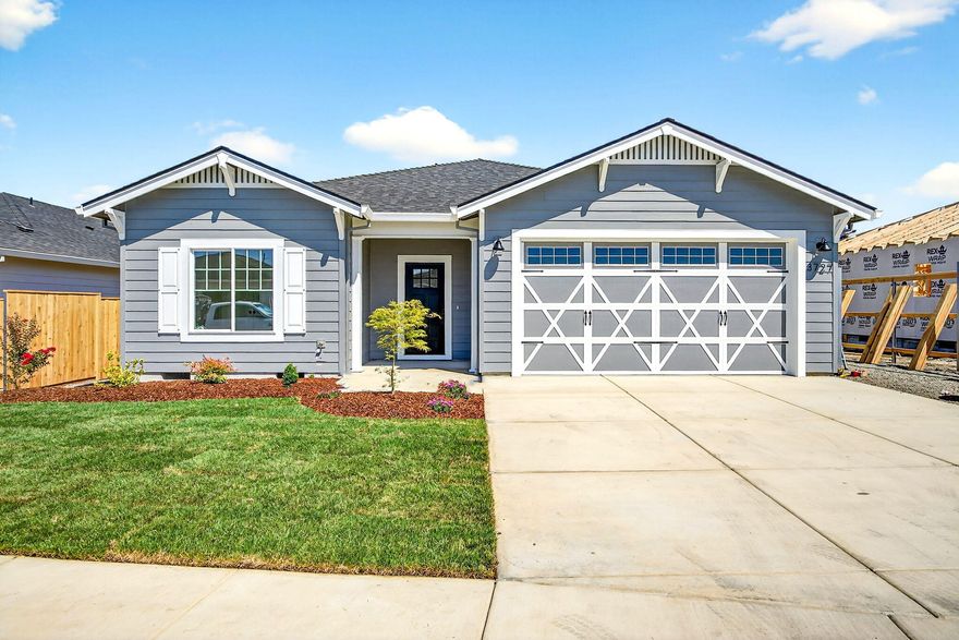 OPEN HOUSE SATURDAY JAN 10th 1:00 - 4:00pm & SUNDAY JAN 11th 1:00 - 4:00pm.
 Built in 2025 in a beautiful country setting in Medford area with views of surrounding mountains nearby! An exceptional quality builder that we've grown to love in the valley throughout the years is what you get when you purchase a home built by Pac Trend Homes. A Stunning craftsman styled home with approximately 1536 sq ft, 3
bedrooms, 2 full baths. Features an open kitchen with beautiful quartz counters, including high end light fixtures and stone fireplace. Custom cabinets are birch and alder with the highest quality in the industry.  Luxury vinyl plank flooring in the entry, kitchen, living room, hallways and bedrooms.  Bathrooms and laundry include tile flooring.  Professional landscaping in front and back round out this house. Estimated completion date August 2025. Other lot and home packages are available. Listing agent is related to seller. Pictures are for illustration purposes only.