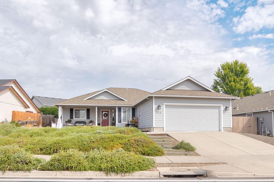 Welcome Home to Eagle Point!
This turn-key property invites you in with a manicured, low-maintenance front entry and a covered porch—perfect for enjoying your morning coffee with a view.
Step inside to an open floor plan featuring a cook's kitchen with breakfast bar and dining area. The spacious living room flows effortlessly into a generously sized master suite with double-door entry and full bath. Two additional large bedrooms and a hall bath provide a functional, family-friendly layout.
Out back, you'll find a large yard ideal for gatherings, pets, and play. Enjoy evenings around the fire pit, plenty of lawn space, established plantings, and the convenience of automated sprinklers.
Don't miss the chance to make this inviting home yours—schedule your appointment today!