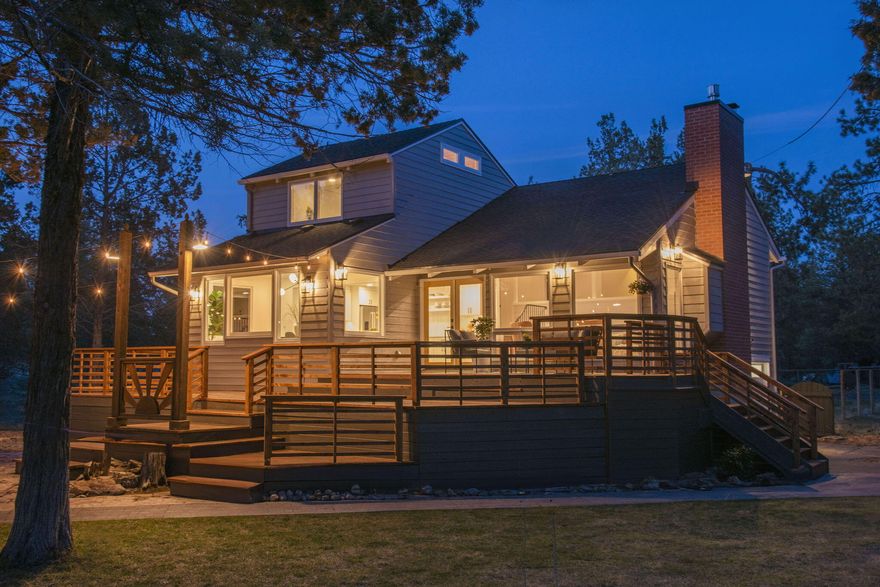 SHORT TERM RENTAL PERMIT! Fully renovated with +$400K in updates and features 4-bed, 2.5-bath single-family home offers 3,168 sq ft of spacious living w/ upgrades throughout. Kitchen has a waterfall quartz countertop, stainless appliances, island & open concept to the dining & great room. Primary includes 2 closets & beautiful bath w/ double vanities & tile shower. There is a great loft as well as 2 separate living spaces. Nestled on a serene 2.35-acres in a quiet cul-de-sac, this property provides privacy, room to roam & potential for multigenerational living. Enjoy the expansive deck & patio, already wired for a hot tub—perfect for relaxing or entertaining under the stars. A huge shop offers endless possibilities for hobbies or storage w/ over 2,280 sq ft and 3 doors (2 -12 ftx10 ft, 1 -14 ftx10 ft). Eco-conscious features include solar panels & EV wiring. Just minutes from Shevlin Park & Tumalo State Park, this location blends quiet rural charm with easy access to outdoor adventure