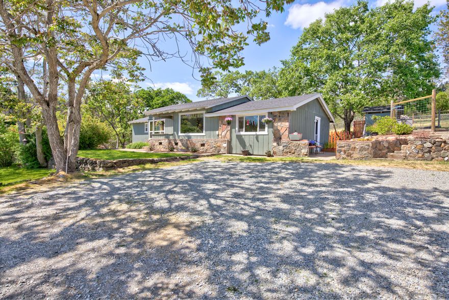 This lovely country property has so much to offer!  There's room for an animal or two on this completely fenced and gated property. Plus a well loved home with a rare 5 bedrooms, family room and living room plus formal dining area. There are garden beds, a private patio area and an in ground pool to enjoy. Put lights on the gazebo and relax on summer evenings as the breeze slides by and the night sky surrounds you.