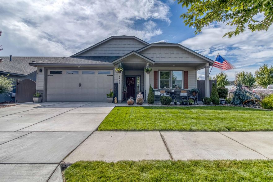 Step into this beautiful, upgraded 3 bedrooms, 2 baths, 1800 sqft home in Maple Meadows subdivision with well manicured trails and common areas. Close proximity to shops, restaurants and access to Bend, Sisters, nearby travels. Delightful designer colors throughout the home, upgraded laminate flooring, floor to ceiling tile surrounding the gas fireplace in the open concept living room and kitchen. Quality light fixtures in dining room, nice floorplan with separation between primary suite and guestrooms. Kitchen features quartz countertops, good size pantry, spacious kitchen island for entertaining, baking & cooking. Wet bar features a wine refrigerator and additional storage. Upgraded garage space to accommodate plenty of storage. Exterior features a backyard in paradise. Pristine landscaping with flowers, water feature, covered patio & a custom built pergola to entertain and relax. Enjoy the covered front porch with sounds of the water feature. This home is move-in ready!