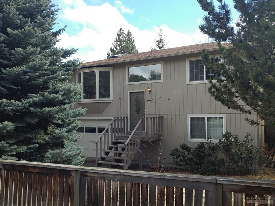 Arguably the best location in town! One block to Columbia Park and the Deschutes River, walking distance to Downtown, Galveston Ave, 14th St., the Old Mill, the water park, ice rink and super close to Mt Bachelor park and ride. 4 bed/1.5 ba with a fantastic fenced backyard. This home has been a successful rental for years. You can turn this into your dream home or keep as a rental investment. You won't need your car here, but it has a garage and plenty of parking.