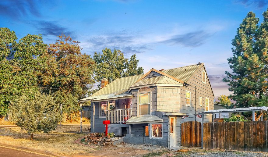 Back on market with no fault of sellers: Great tri-level home offers so many living options! Main level boasts the architectural features of a 1929 home including wooden floors, curved ceilings, two bedrooms and a full bath. Upstairs offer bedroom & bonus area. The walk-out basement (which has living area, bedroom, full bath & separate entrance) adds a lot of flexibility to the property. Could make 4th bedroom, office, storage, studio space, or separate living space. Sellers have rented out basement unit for $550 in past & one of the bedrooms for $425/month. Potential to become an income generating property. Generous sized yard is fenced for privacy. Most furniture can be included with sale if desired. Sellers have put a lot of love into improving this home and it is ready for the next owners to enjoy.  See www.801Delta.com.  Make appointment to view this sweet home today! Back-up offers accepted.''