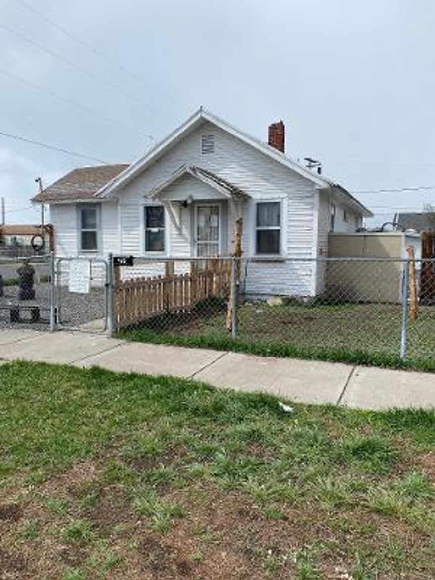 Investment property total remodel needed.  It has flooring down and bathroom is partially done.  Kitchen needs flooring and cabinets, and appliances.  This is being sold as is.