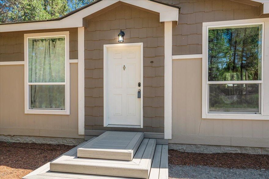 Not a drive by! Must see to appreciate! Upgraded newer, well-maintained home features 3 spacious bdrms, 2 full baths, and sits on a generous half-acre lot—ready for your dream shop with power and water already in or extra outdoor living space offering the perfect balance of comfort, space, and natural beauty. Over $30K in upgrades including coffered ceilings, upgraded foundation, water treatment system, Quadrafire Mt. Vernon AE pellet stove, water and electric run to the other side of the property with frost free, and more! Ideally located just minutes from the shops and restaurants of Sunriver, this property combines the best of both worlds: peaceful seclusion and everyday convenience. Amazing location for outdoor enthusiasts!