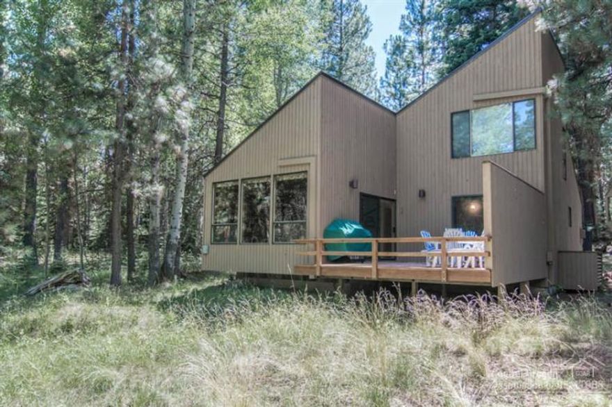 ASPEN HOUSE #5. Well maintained unit with metal roof, recent paint, newer deck and air conditioning! This Aspen Home is on a very special lot. End unit bordering large open space that features a small brook, beautiful Fir and Aspen trees, and Aspen Lake! Furnished as shown.