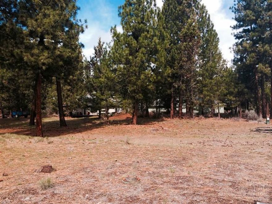 Beautiful parcel in the coveted Buck Run neighborhood of Sisters, OR. Mature tees, walking distance to town, Whychus Creek, Sisters Trails, Movie House and more!