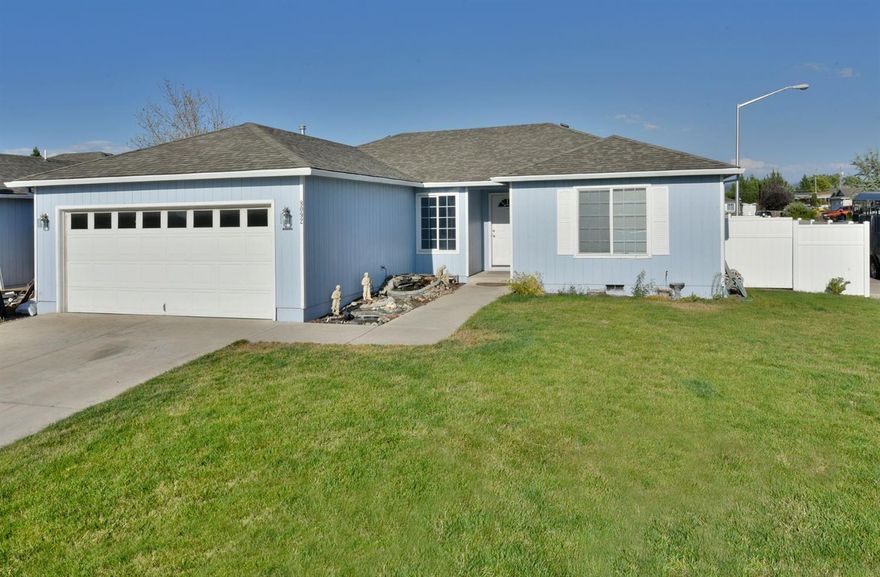 Hard to find, well cared for 4/2 on a corner .14 acres, fully vinyl fenced back yard, room and power for a hot tub, full sprinkler system in the front and back, even showcasing a water feature! Room for a garden on the side of the house, Nicely done remodel with new floors, tile in the bathroom, new paint in the main room! This is an awesome home for anyone. Don't miss out!!