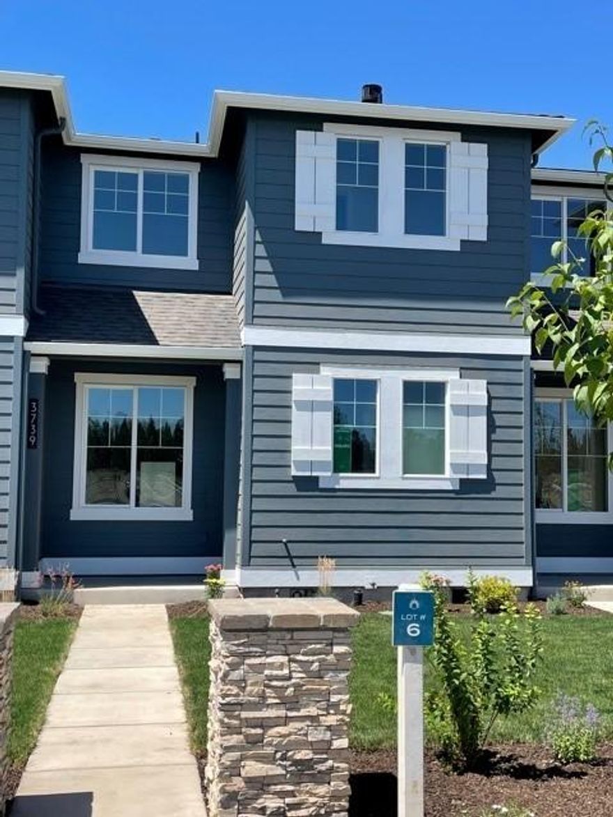 Live large in a Parkside middle unit townhome by award winning quality builder Pahlisch Homes in our much anticipated new Petrosa Community in NE Bend OR.  Visit PetrosaBend.com for overview. You will love the open concept kitchen/dining/great room with cozy gas fireplace and light/bright loft with skylights!  Quality finishes include: 6 inch baseboards, white cabinets, Quartz counters throughout, stainless steel appliances, luxury vinyl plank flooring throughout main floor, bathrooms and laundry AND much more! Double wall construction for added insulation, Hardie Plank lap siding and gutters.   Photos are of similar floorplan in different community, specs vary. Front yard landscaping and AC included.  Heating and cooling through Mitsubishi heat pump zoned system. Homeowners and residents here will have access to a full spectrum of private recreational amenities including swimming pools, parks, green spaces, and paved paths by Summer 2023.  Be among the first to live in Petrosa!