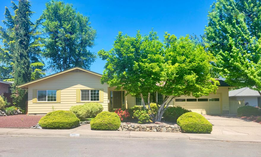 Desirable established NW Grants Pass Neighborhood!  This 3 bedroom, 2 bath, 1594 S/F Home features a permitted 1 bedroom, 1 bath, 500 S/F ADU, perfect for a 2-family set-up or rental!  The main home features a spacious kitchen & family room with beamed ceilings, wood burning fireplace insert, and a light & bright living room.  Other features include new carpet, all vinyl windows, and interior paint.  This home has all the charm of the 60's... ready for you to make it your own with bathroom updates and decorating!  This delightful low maintenance property has a detached 280 S/F building for a possible office or hobby room.  All buildings have a new Owens Corning 40 yr. Roof.  Attached 2-car garage.  Recent Home Inspection completed with a Certificate of Completion on repairs.  One Year Basic FATCO/CRES Home Warranty provided at closing.  Amenities List is available.