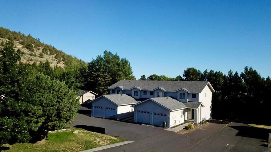 Seller financing available. Excellent location at Pilot Butte, one half mile from St. Charles Hospital. New roof and exterior paint in 2024. All units 2 BD/2.5 BA townhomes with single-car garages. 100% occupied with upside in rents.