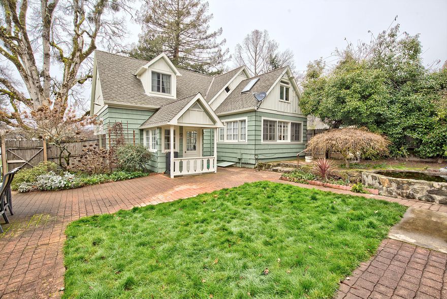 Almost an acre, zoned for possible split, located in NE Grants Pass. This is a great place to raise a family or create a multi-generation living situation. The main house is over 2800 square feet with 5 bedrooms (one without a closet or heating vent). Downstairs primary bedroom with en suite bathroom is wheelchair friendly and roll in shower. There is a living room and a family room, an updated kitchen and a dining room big enough to seat a crowd. Lots of built-ins means plenty of storage. The 3 car garage has 1 bay with a bathroom and partial kitchen and upstairs is a spacious, well lit studio (928 sf) that makes a wonderful rec room, art or dance studio or use it as additional living space. There is plenty to explore outside-massive trees for shade plus fruit and nut trees, an in-ground pool, fish pond, large garden area, an outdoor bbq and plenty of room for whatever outdoor activities call you. This is a wonderful place for entertaining too! Call today for your personal tour.