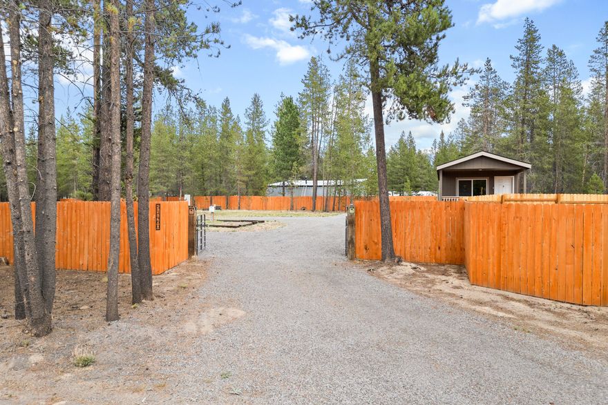 Discover peace and privacy on this beautiful .58-acre property, featuring a charming single-wide home built in 2023 along with well and septic. This level, fully fenced lot with RV hookups, a 60 amp service panel, and Septic ports offers endless possibilities—whether you're dreaming of a large garden, space for pets, or simply the freedom of extra elbow room in a serene setting. Inside, you'll find a functional floor plan with brand-new stainless steel appliances and eat bar. A highlight of the home is the inviting front porch, perfect for enjoying your morning coffee, unwinding with a book, or taking in nature. The location strikes the perfect balance. The property is located directly next to 18-hole Paulina DISC Golf Course. Whether you're looking for a peaceful getaway, your first home, or a property with space to expand, this well-maintained home offers the comfort, privacy, and lifestyle y