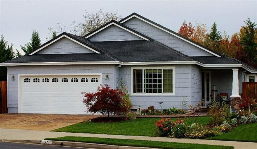 Amazing home in desirable Glen Wood Subdivision. Quality construction and pride of ownership show in this contemporary style home. The exterior boasts a stamped concrete driveway and new exterior paint. Well appointed interior amenities which include granite kitchen counters, hardwood floors, gas fireplace, vaulted ceilings, and open floor plan. Large Master bedroom with vaulted ceiling, walk-in closet and slider to the back yard. Master bath has double vanity, Big fenced backyard has a covered patio with a ceiling fan. RV parking with double gate. The City of Eagle Point's newest park, Lucas Park, is being built just down the street. Come tour this beautiful home today!