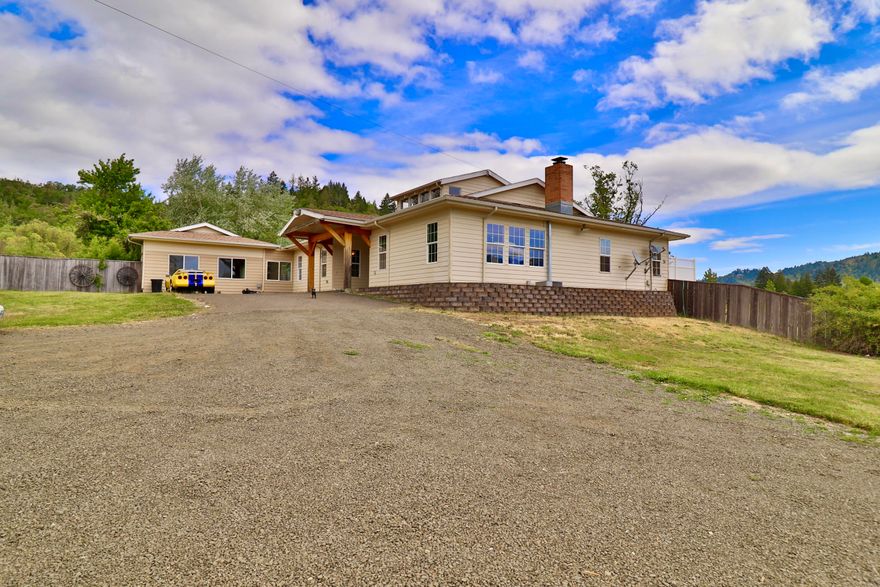 Incredible opportunity with tons of room! Large acreage property with a massive partially finished shop, two extra buildings finished for office space for a home business or anything else desired! Main home has a stunning high ceiling entry, wood floors through out, granite, sun room, private balcony off master w/hot tub! So much to offer here!