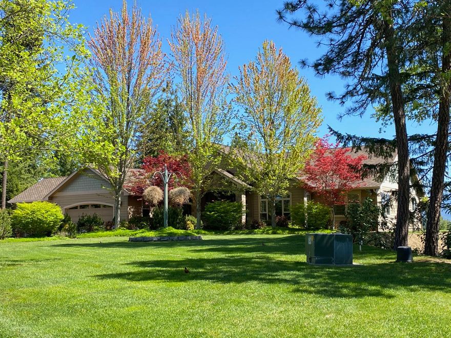 This private estate rests on 10.13 parklike acres consisting of two separate tax lots. Built with uncompromising quality, this 3 bedroom, 3 bath, 3000+/- square foot home offers an open floor plan with well-appointed kitchen, office, coffered ceilings, 3-car finished garage, and a spacious master suite. The property has two sources of domestic water, paved driveway with security gated entry, wonderful views of the valley, and room for shop or ADU on the additional separate tax lot.  This property has so much to offer and is sure to exceed your expectations. Conveniently located, minutes to Grants Pass City Center with restaurants and shopping, in a secluded rural neighborhood of upscale homes, (only 6.6 miles from Grants Pass FBO airport).  All measurements deemed accurate, buyer to verify.