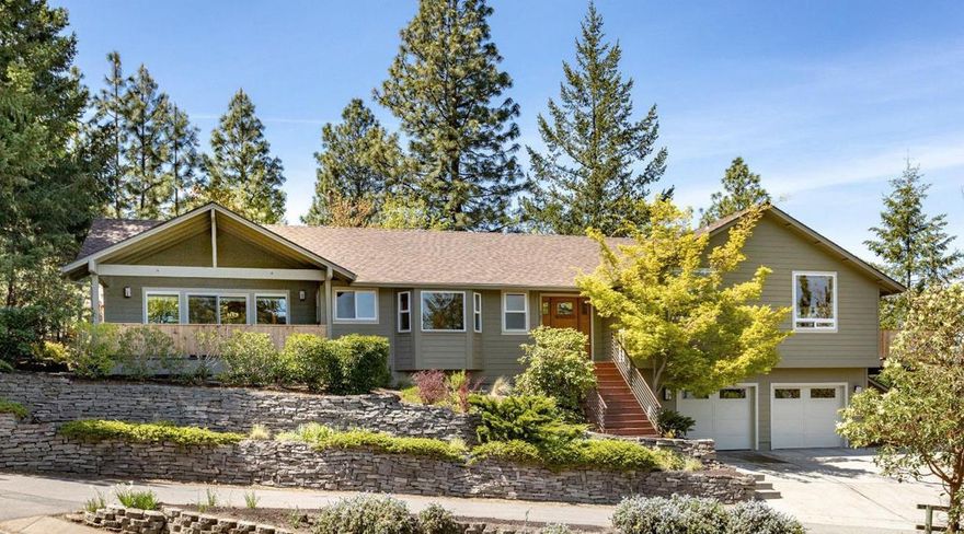 Completely remodeled home in 2014 situated on a spectacular view lot above the boulevard. This custom, contemporary home is dramatic, spacious and offers main level living. Inside you will find vaulted ceilings, beautiful windows to enjoy the incredible views from the spectacular and spacious great room with vaulted ceilings and lots of natural light. Home includes: hardwood, granite, tile, fireplace, three decks, 3 bed and 2.5 bath plus den, 2-car attached garage, additional bonus room, detached building that could be easily converted into additional living space, exercise room or office and lots more. You will love the yard with fabulous mature trees and the lot with it's proximity to hiking, biking and running trails. All of this while still located close to downtown Ashland. Don't miss your opportunity to view this wonderful property.